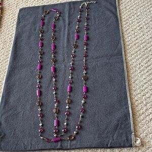 Elegant Purple and Brown Beaded Necklace
70 inches long.